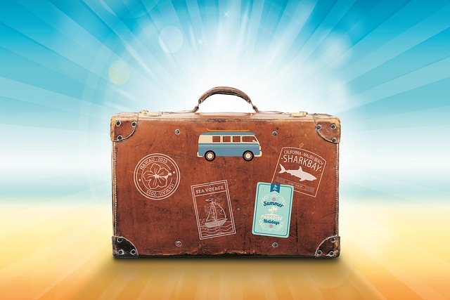 A beach bag packed with essentials for a Croatian beach trip: sunscreen, hat, sunglasses, water bottle, and a towel.
