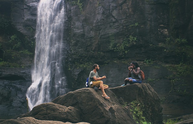 A couple hiking in a scenic national park, illustrating budget-friendly outdoor destinations (budget friendly weekend trip ideas)