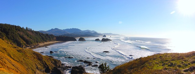 Haystack Rock at Cannon Beach, Oregon with dramatic coastal scenery