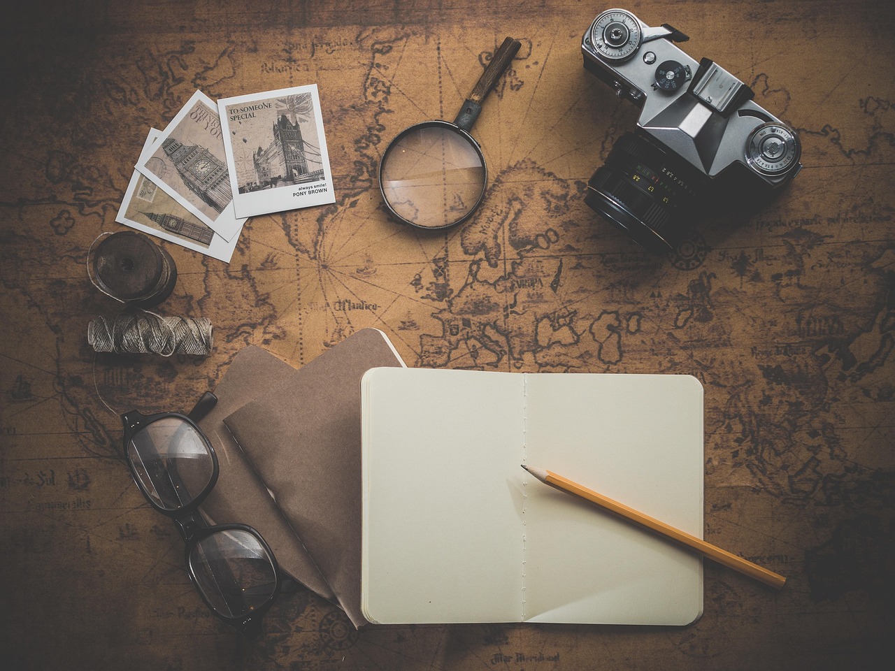 person planning trip budget map